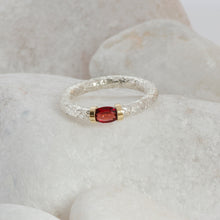Load image into Gallery viewer, An African Garnet hand textured Sterlin Silver ring with a Gold shoulder decoration