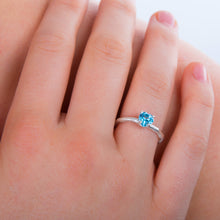 Load image into Gallery viewer, Blue Topaz cut in the shape of a heart, set into a sterling silver mount