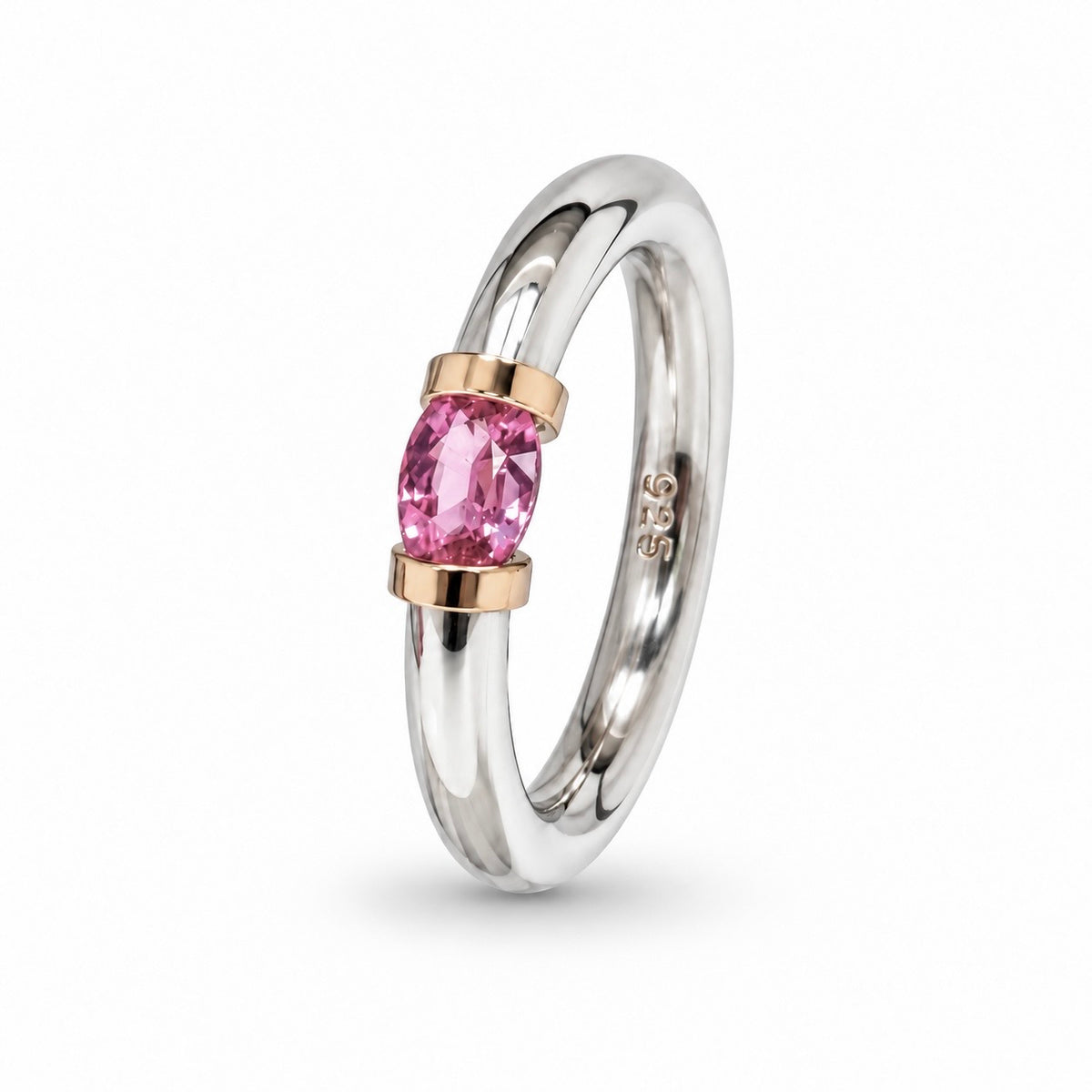 A Sterling Silver Pink Sapphire Tension Set Ring With Gold Detail