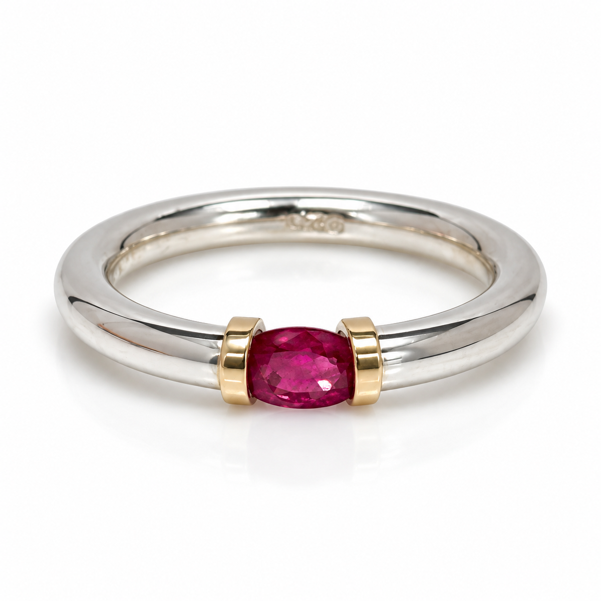 A Sterling Silver Ring With A Natural Ruby And Gold Decoration