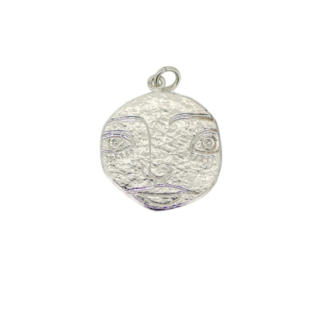 Silver Textured Pendant With A Hand Engraved Face