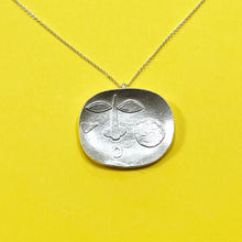 Load image into Gallery viewer, Large Sterling Silver Face on a Dish Shaped Silver Pendant
