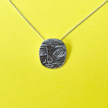 Load image into Gallery viewer, Hand Engraved Silver Rock Texture Face Pendant
