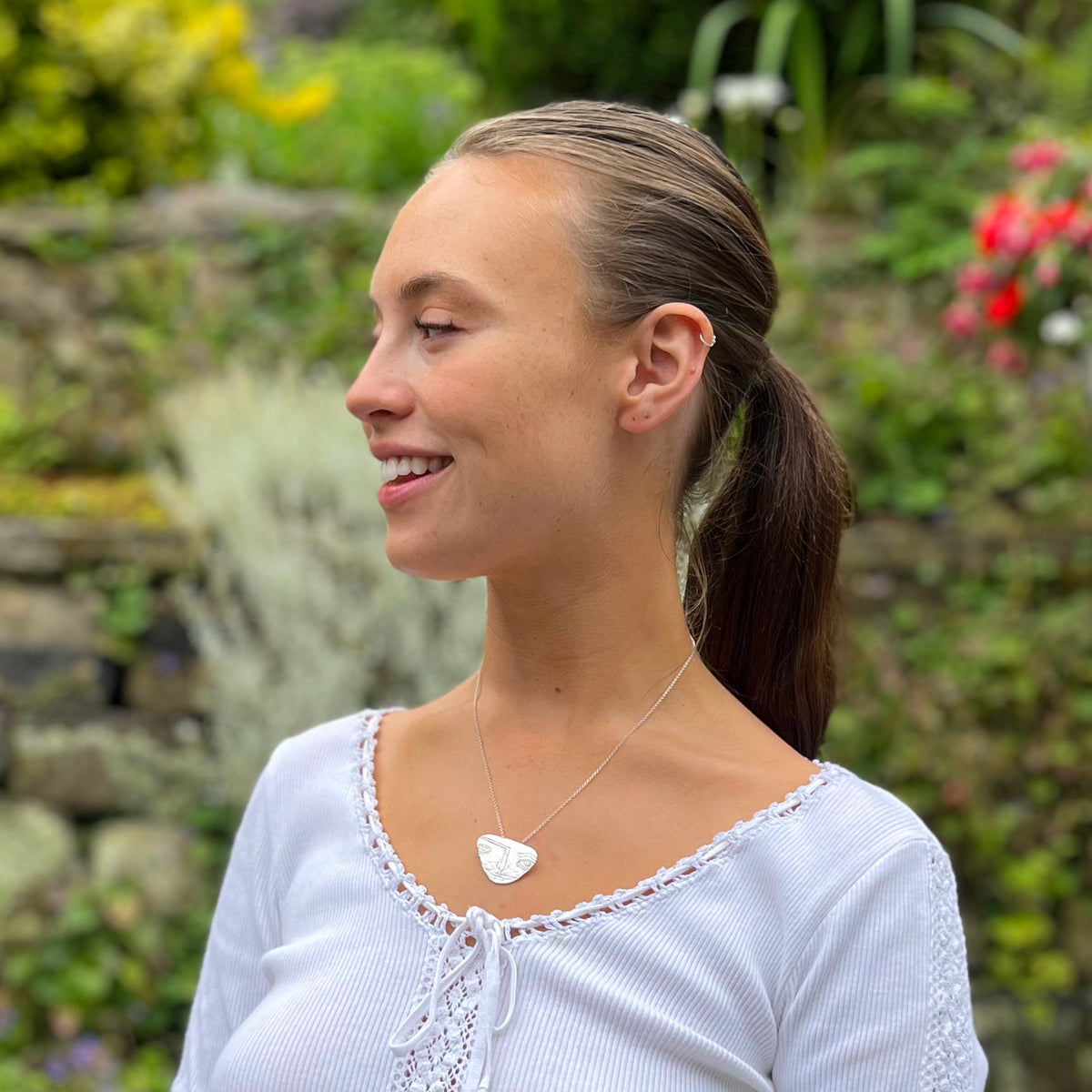 Silver face mask necklace