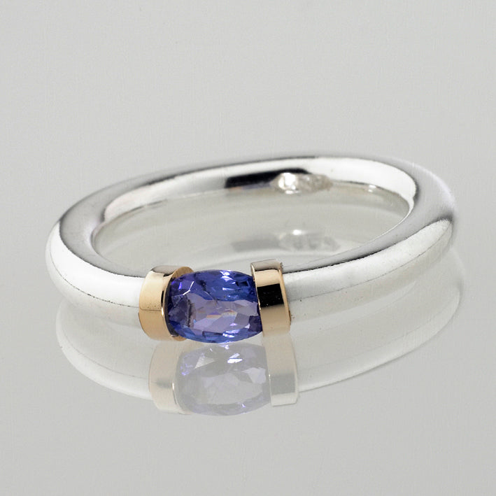 Tanzanite gemstone ring in Silver and gold.