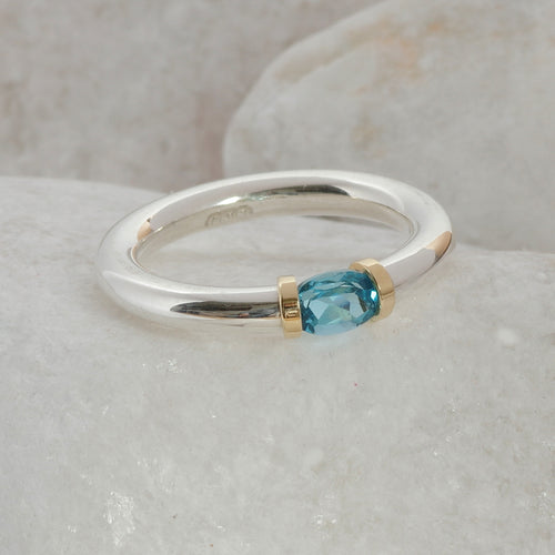 Silver and Gold Swiss Blue Topaz Tension Ring