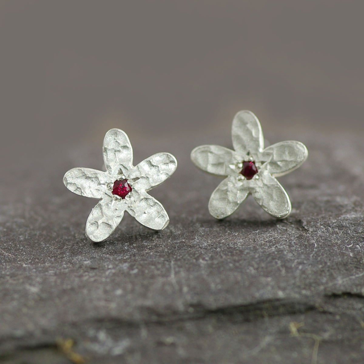 Ruby and Silver Earrings in a Hand Textured Flower Design