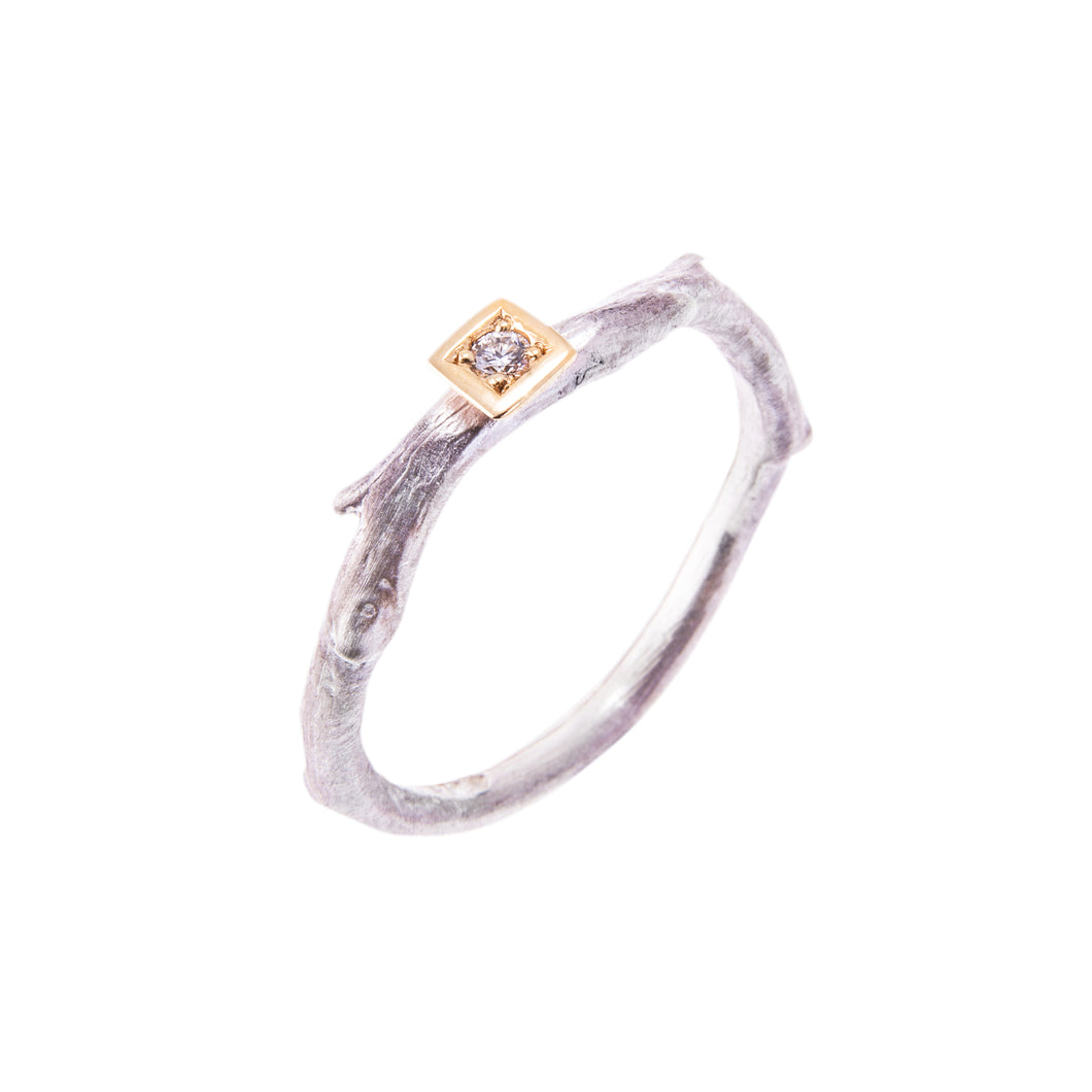 Organic Silver Ring Set with a Diamond in a Gold Square
