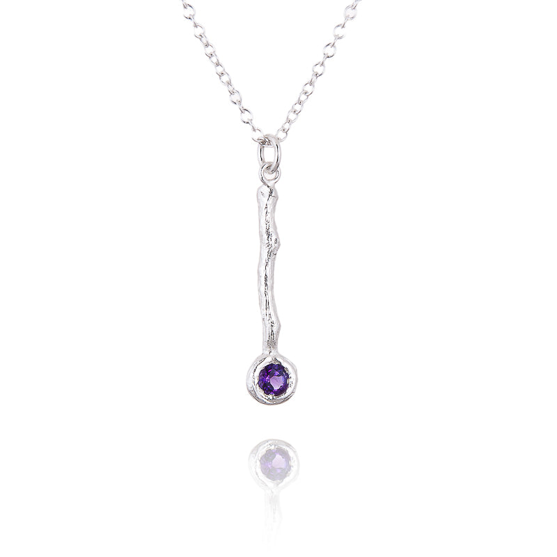 An Amethyst drop pendant  in a twig style design in silver