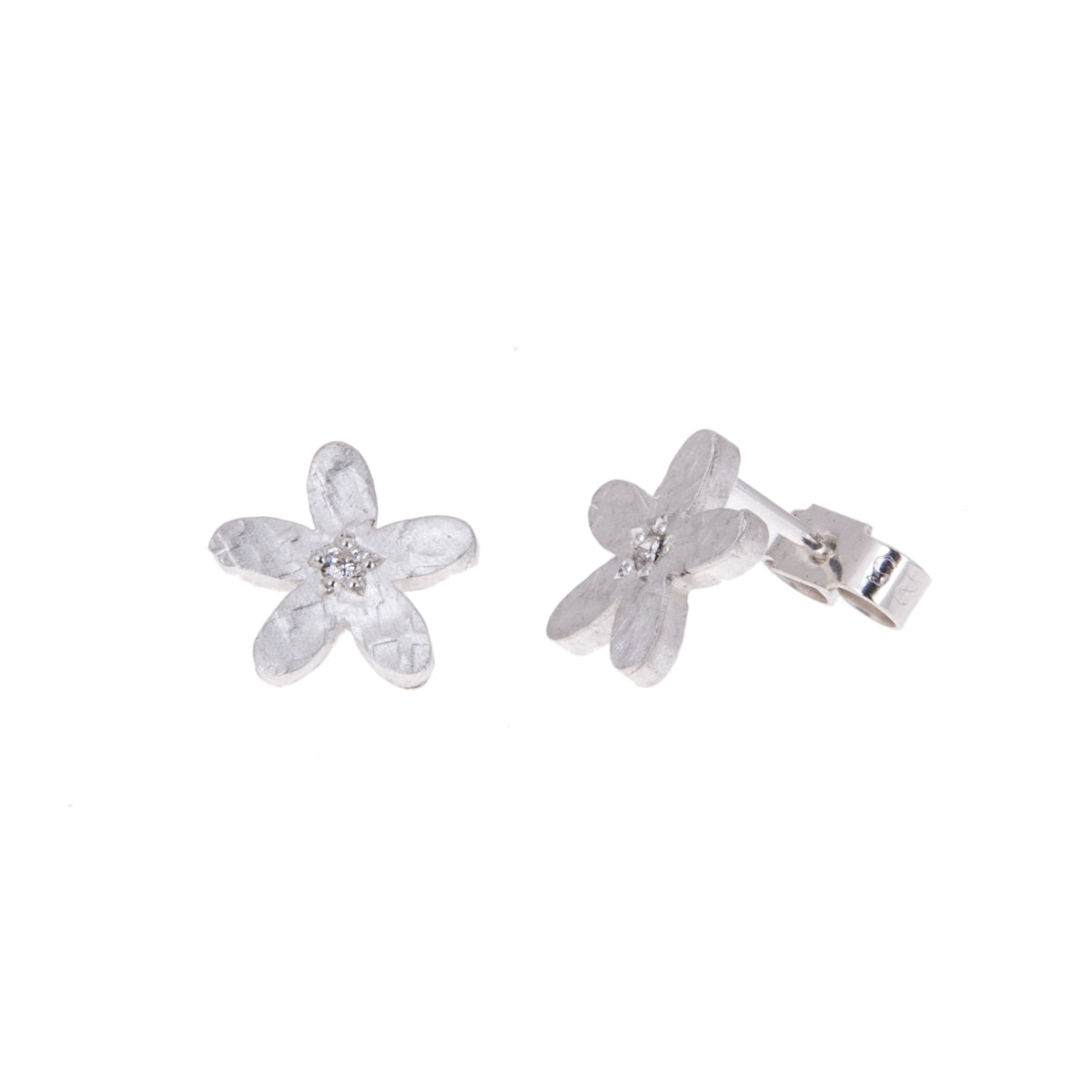 Diamond flower ear studs in silver