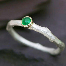 Load image into Gallery viewer, An Emerald Ring in Sterling Silver and Gold.
